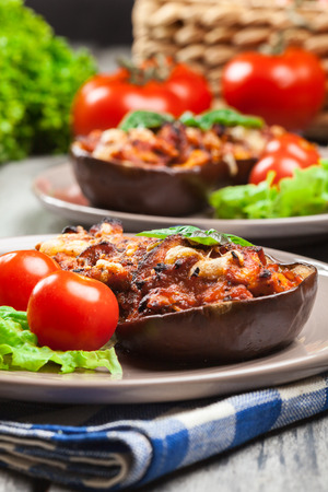 Baked eggplant with pieces of chicken in tomato sauceの写真素材