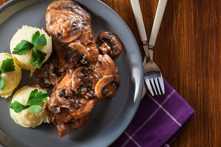 Delicious chicken marsala served with fettucine pasta. Italian cuisine. Top viewの写真素材