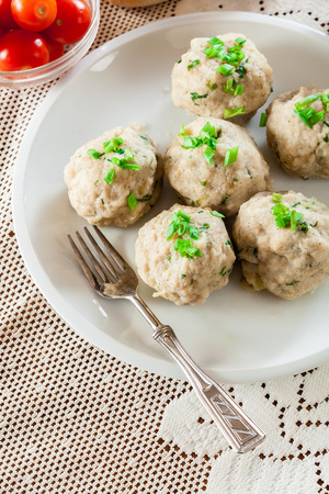 Homemade bavarian bread dumplings served on a white platterの写真素材