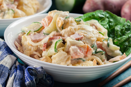 Delicious potato salad with ham, boiled egg and cucumber. Japanese dishの写真素材