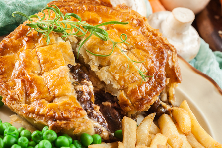Homemade beef stew pie with french fries. Meat in puff pastryの写真素材