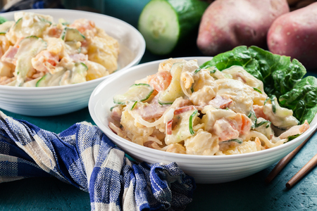 Delicious potato salad with ham, boiled egg and cucumber. Japanese dishの写真素材