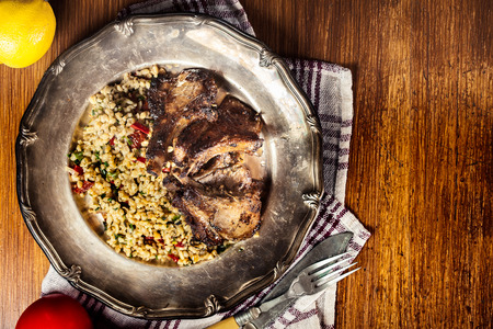 Roasted lamb chops served with bulgur wheat. Food and drink conceptの写真素材