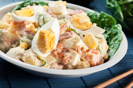 Delicious potato salad with ham, boiled egg and cucumber. Japanese dishの写真素材