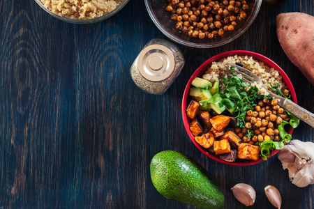 Colorful buddha bowl with quinoa and roasted and fresh vegetables. Healthy food conceptの写真素材
