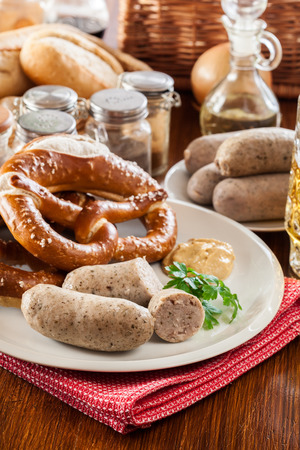 Bavarian breakfast with white sausage, pretzel and beerの写真素材