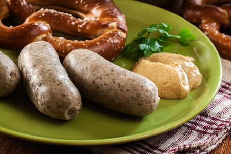 Bavarian breakfast with white sausage, pretzel and beerの写真素材