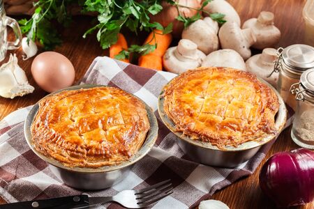 Fresh beef stew pie on a baking casseroleの写真素材