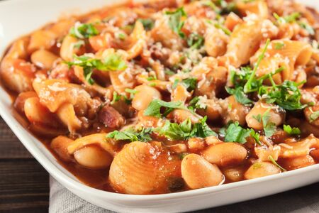 Pasta e fagioli - pasta with beans and parmesan. Italian dishの写真素材
