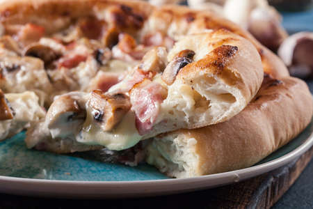 Pizza Bianca with bacon and mushrooms. Italian dishの写真素材