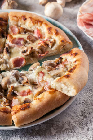 Pizza Bianca with bacon and mushrooms. Italian dishの写真素材