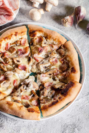 Pizza Bianca with bacon and mushrooms. Italian dishの写真素材