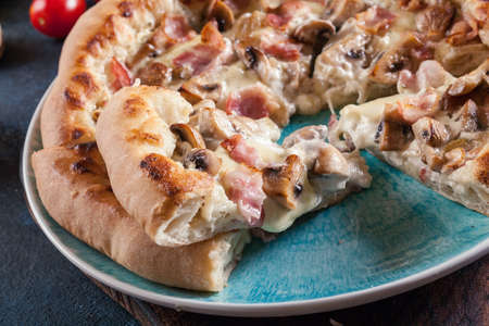 Pizza Bianca with bacon and mushrooms. Italian dishの写真素材