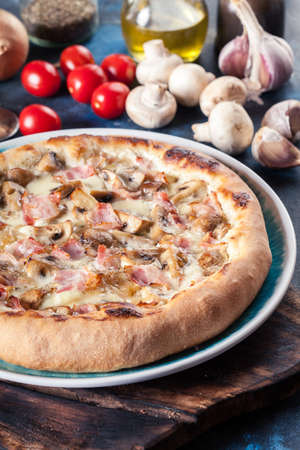 Pizza Bianca with bacon and mushrooms. Italian dishの写真素材