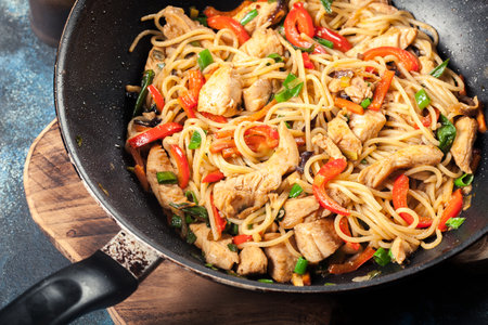 Chicken chow mein. Popular fried noodles with chicken and vegetablesの写真素材