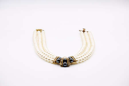 Beautiful pearl necklace on black backgroundの写真素材