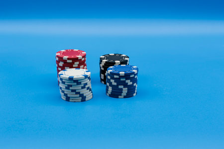 pictures of poker chips on a blue backgroundの写真素材