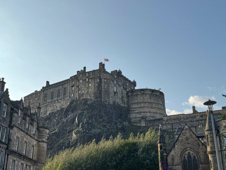Edinburgh Castle, a historic fortress dominating the skyline of Edinburgh, Scotland, stands proudly...
