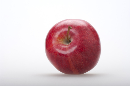 Tasty red apple on white background in front viewの写真素材