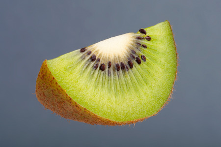 Ripe Juicy Kiwi Fruit, Part, Cross Section. Studio shoot retouched.の写真素材