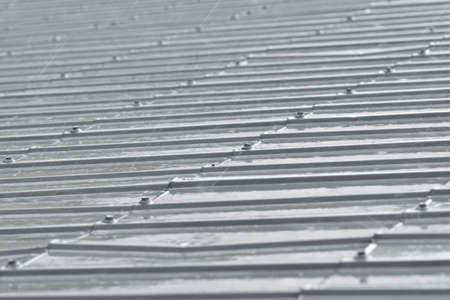 Raindrops falling on the roof during a downpour. Rain.の写真素材