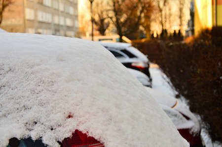 Cars parked on the street covered with a thick layer of snow. Winter.の写真素材