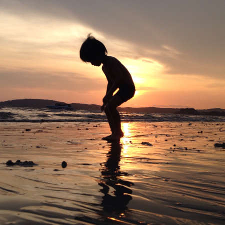 Little child on the beach.の素材
