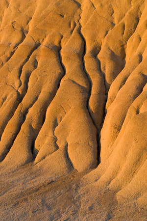 erosion rills in badlands, background pattern