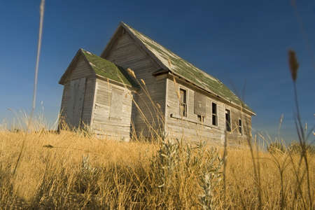 abandoned farm in canadian prairieの写真素材