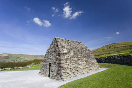 touristic medieval gallarus oratory, some clouds, blue skyの写真素材