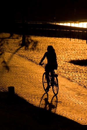 biker silhouette orangeの写真素材