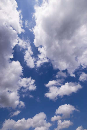 cumulus clouds on blue sky,portrait,wide angle