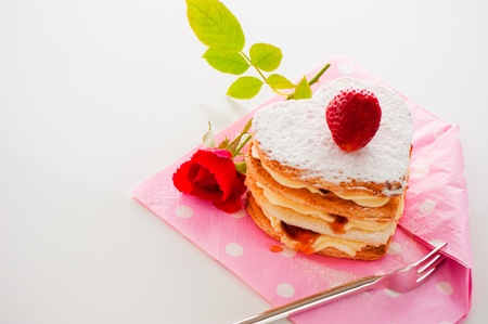 Beautiful decorated cake, heart with strawberryの写真素材