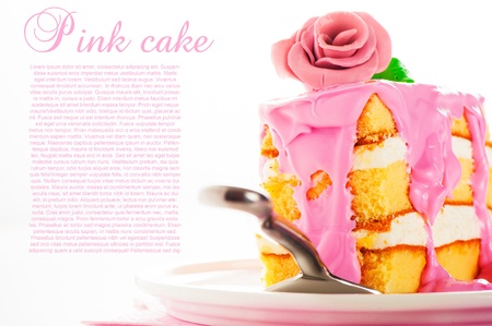 Small piece of three layer vanilla cake with cream and strawberry frosting  Pink rose as decoration on the top  White backgroundの写真素材