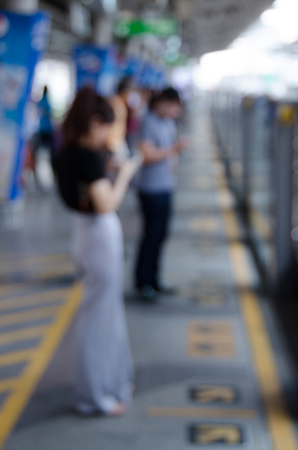 blurred person waiting for the metro