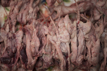 Fresh stacked rats on an Asian marketの写真素材