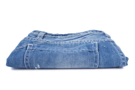 Stack of blue jean isolated on white backgroundの写真素材