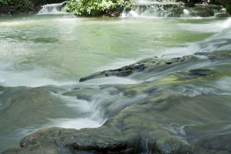 Waterfall in tropical forest, Thailandの写真素材