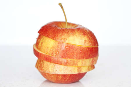 Isolated red apple slices