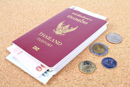 Thailand passport and Thai moneyの写真素材