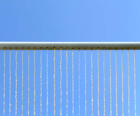 Water splash with blue skyの写真素材