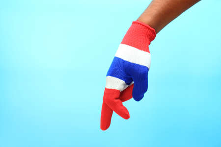 Knitted gloves with Thailand national flagの写真素材