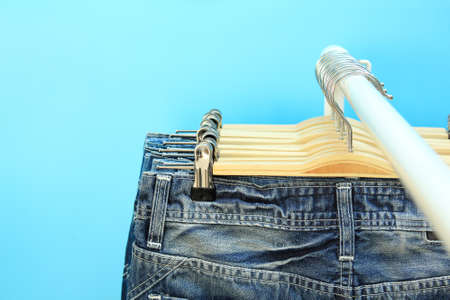 Close-up of jeans on a rackの写真素材