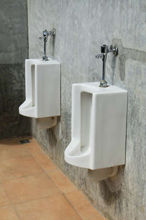 Urinals in a public restroomの写真素材