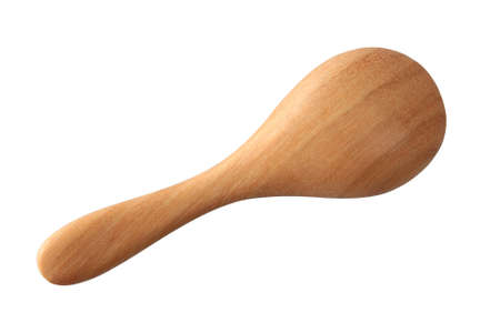Wooden spoon isolated on a white background