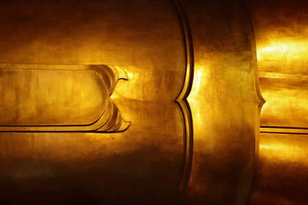Reclining buddha gold statue, Thailandの写真素材