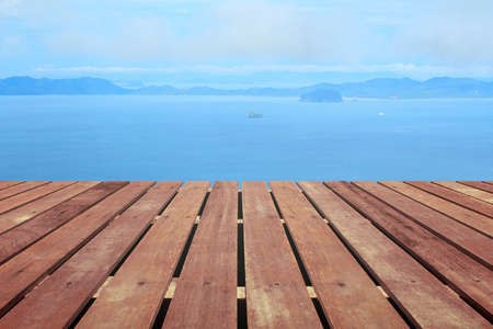 Tropical beach with wooden floorの写真素材