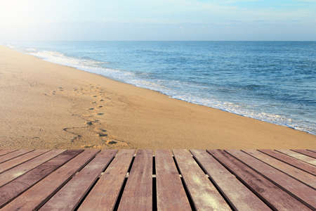Tropical beach with wooden floorの写真素材