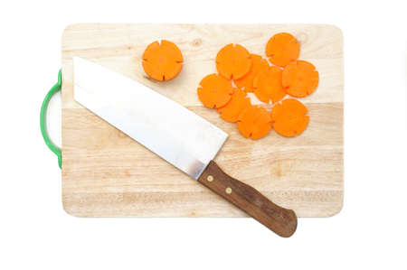 Kitchen Knife and carrots on a wooden backgroundの写真素材