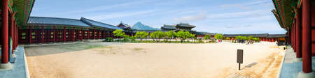 Gyeongbokgung Palace against beautiful blue sky in Seoul, South Korea. Panoramaのeditorial素材